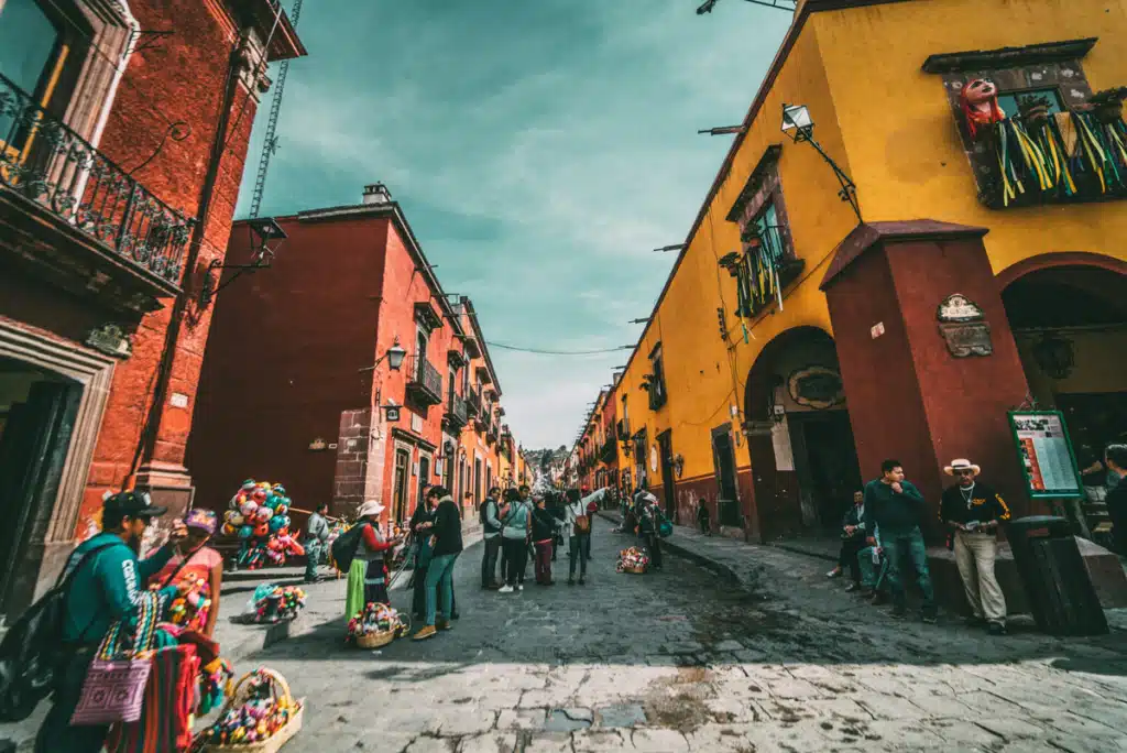 The streets of Mexico, which are busy and colorful. Shipping from US to Mexico enables many people on these streets to access American goods.