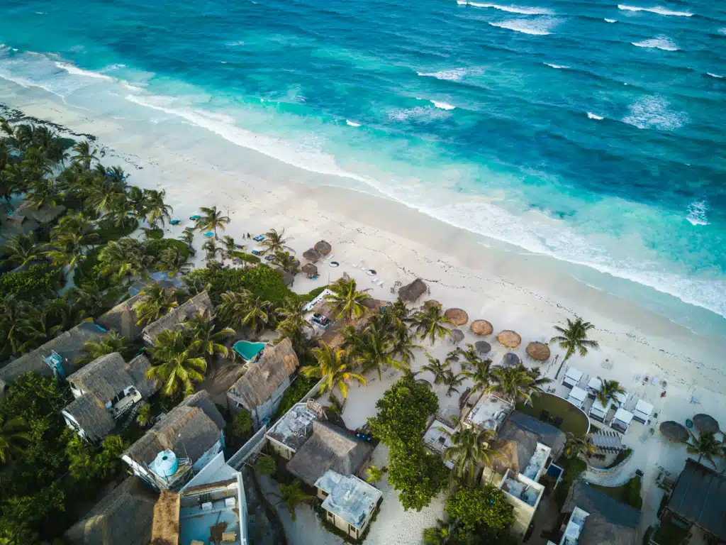 A beach in Tulum, where shipping from US to Mexico is easy due to their sea and air access.