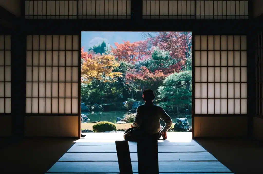 Someone is sitting peacefully in a Japanese garden, taking a break from being stationed at Iwakuni marine base housing. 