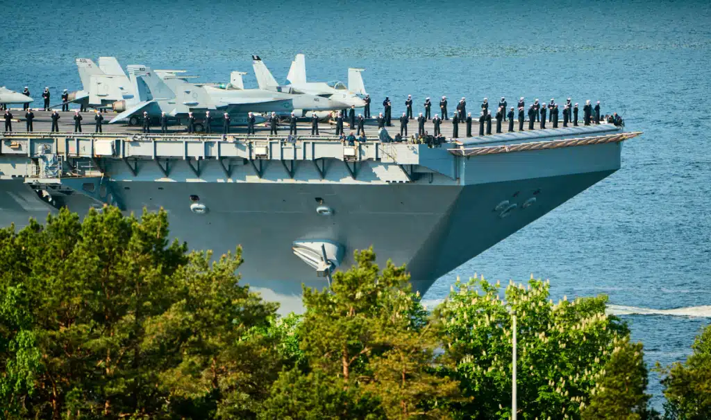 An aircraft carrier, which can receive mail sent to a US military base, depending on the address of the soldier.