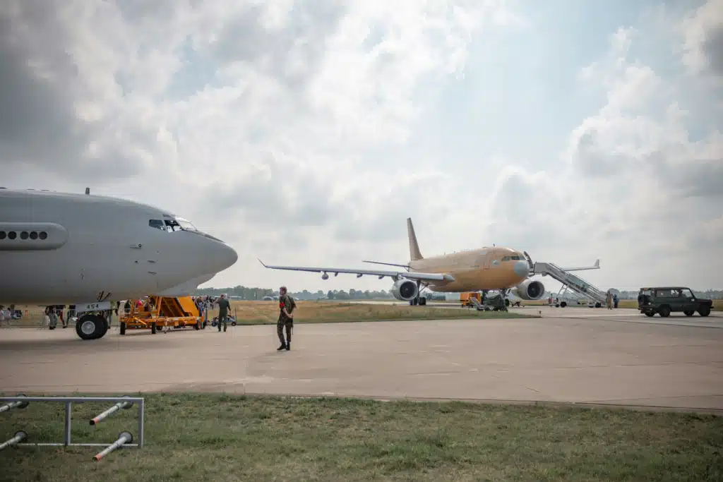 Two airplanes on a tarmac, used for shipping to Netherlands From US.