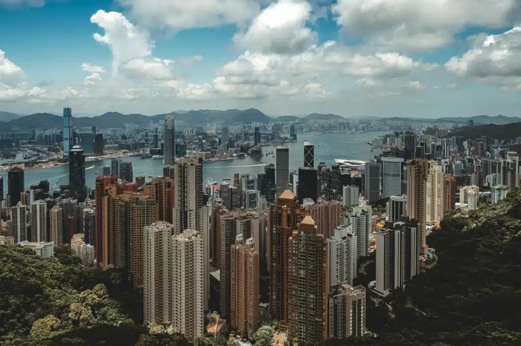 A Hong Kong cityscape during the daytime, where shipping from US to Hong Kong happens daily via PostFromUS.