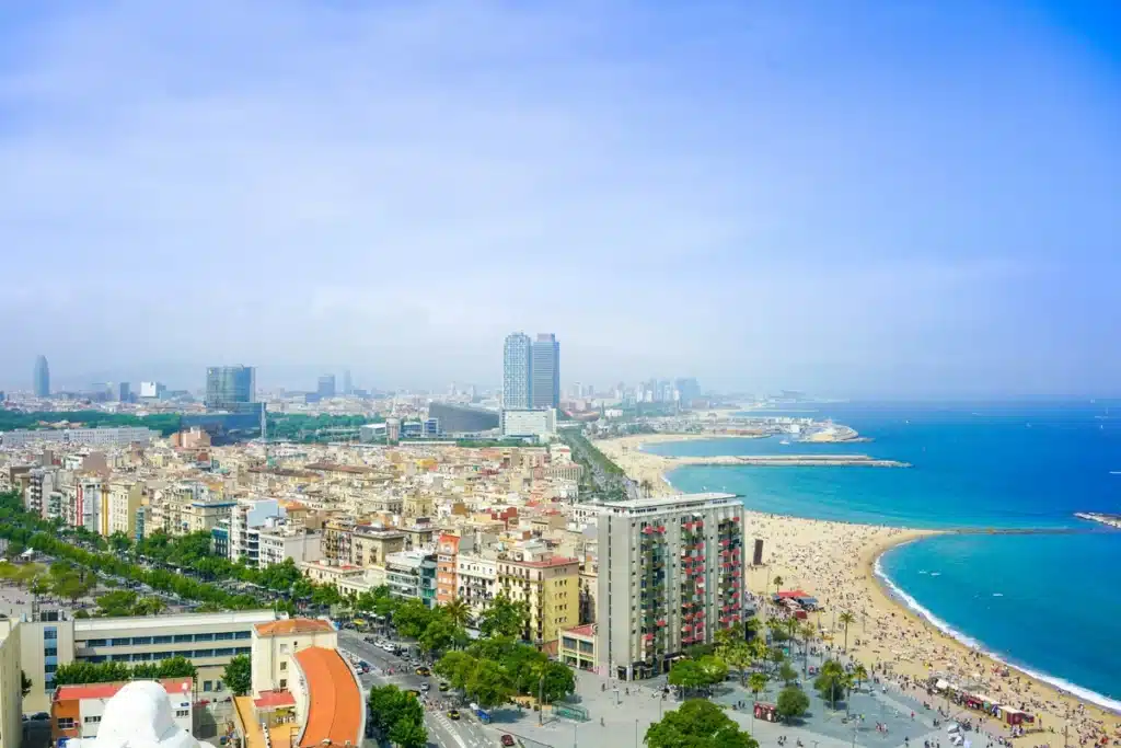 A coastal city, where shipping to Spain from USA is accessible by boat.